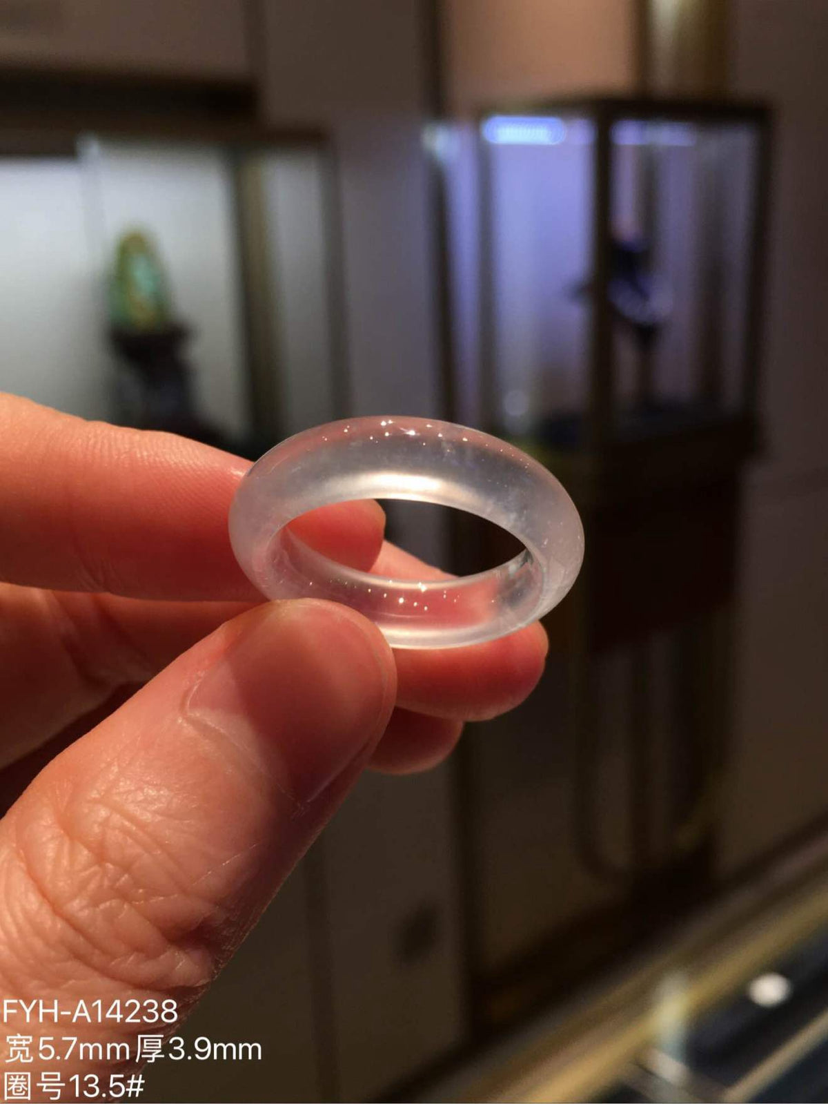 Profile view of the unmounted jadeite band ring showing its polished curve