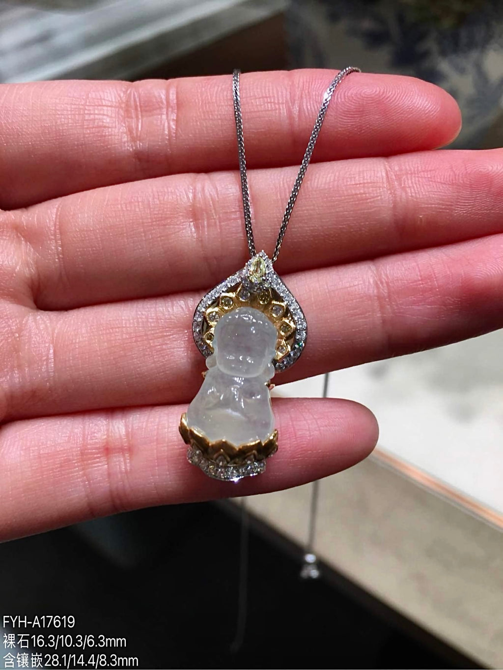 Closer front view of high-ice jadeite Baby Buddha pendant