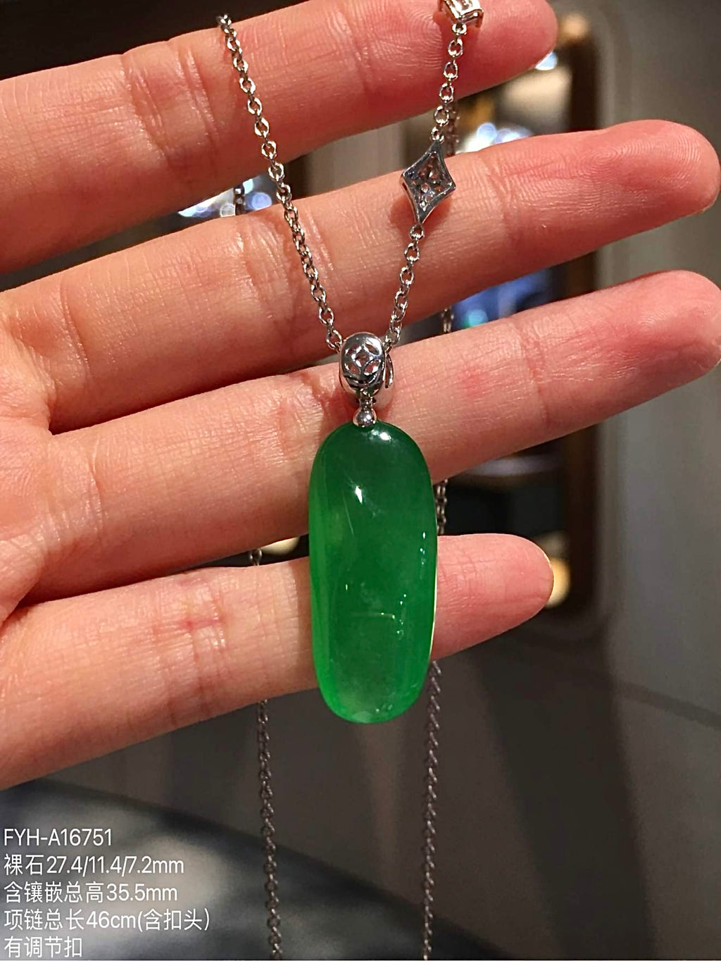 Back view of jadeite Fu Gua necklace and gold pendant setting
