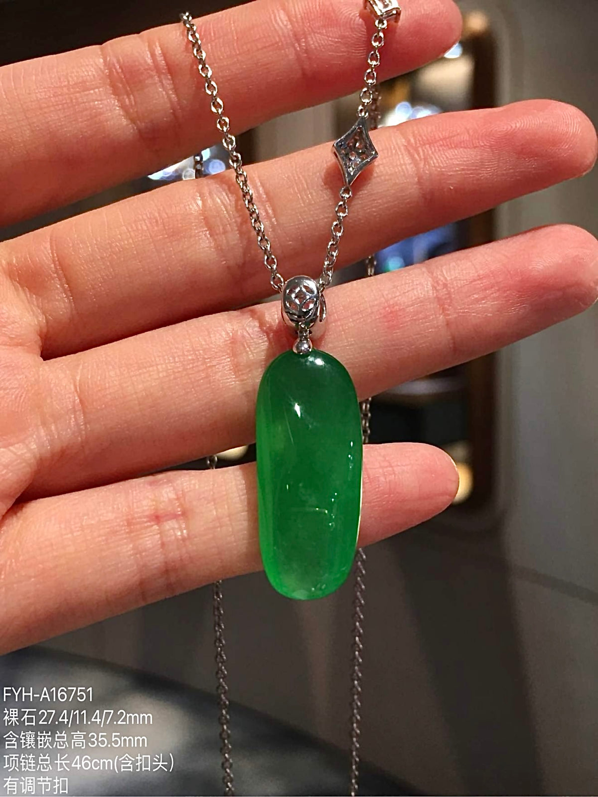 Back view of jadeite Fu Gua necklace and gold pendant setting