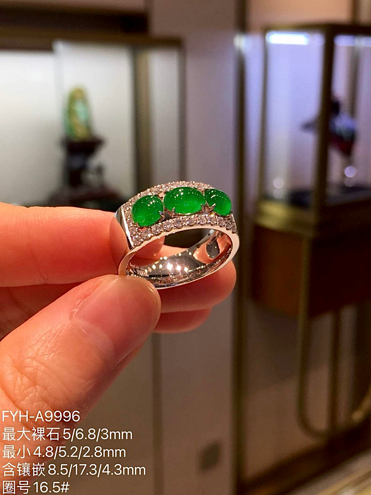 High-Ice Zhengyang Green Three-Stone Jadeite Ring in 18K Gold & Diamonds