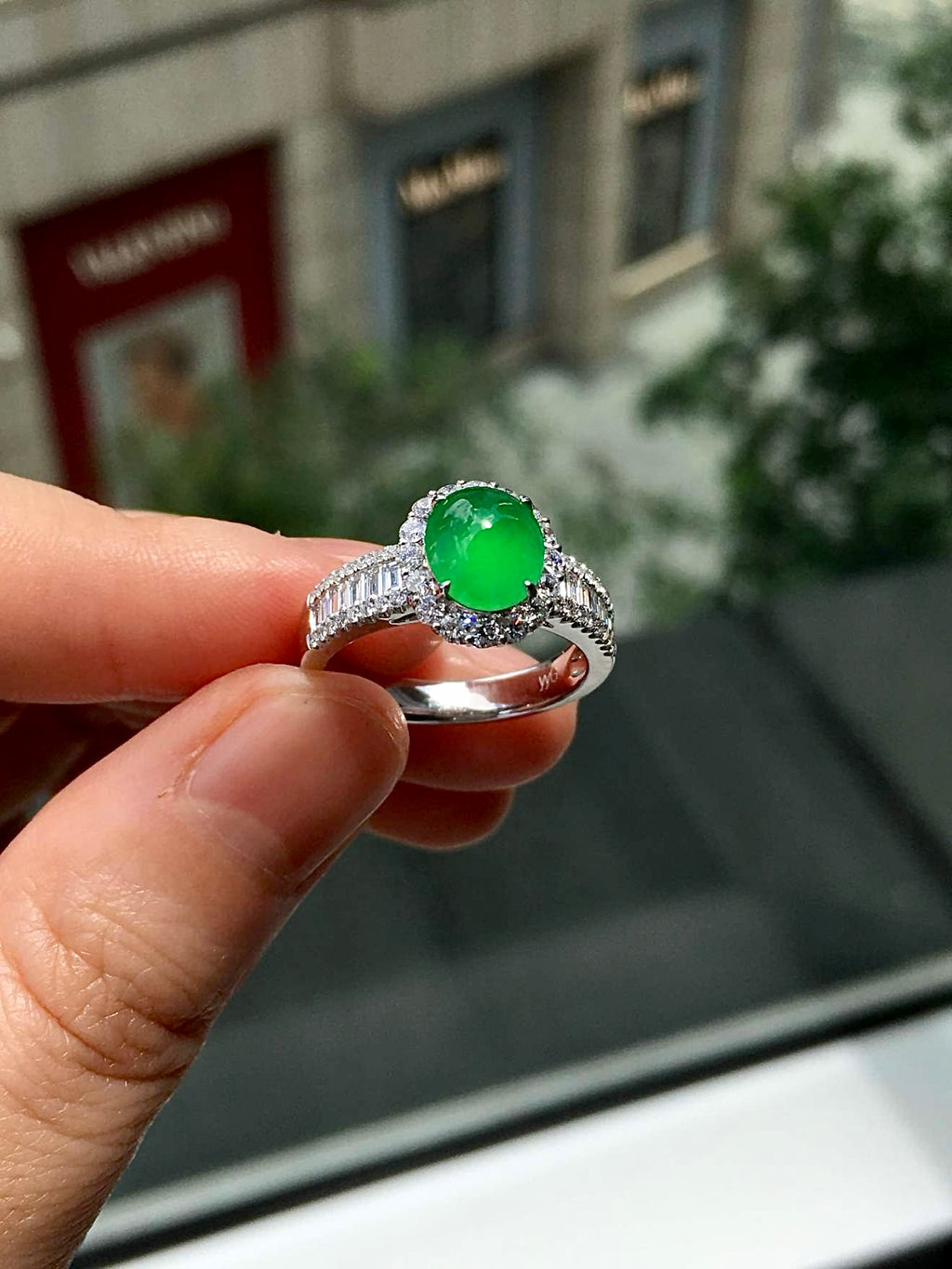 High-Ice Imperial Green Jadeite Halo Ring in 18K Gold & Diamonds