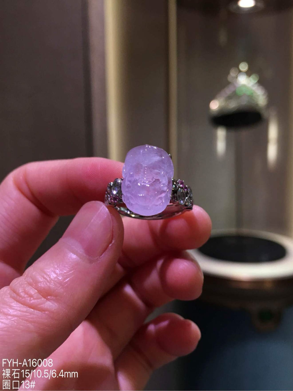 Front view of FYH-A16008, a high-icy lavender jadeite Pixiu ring set in 18K gold with diamonds