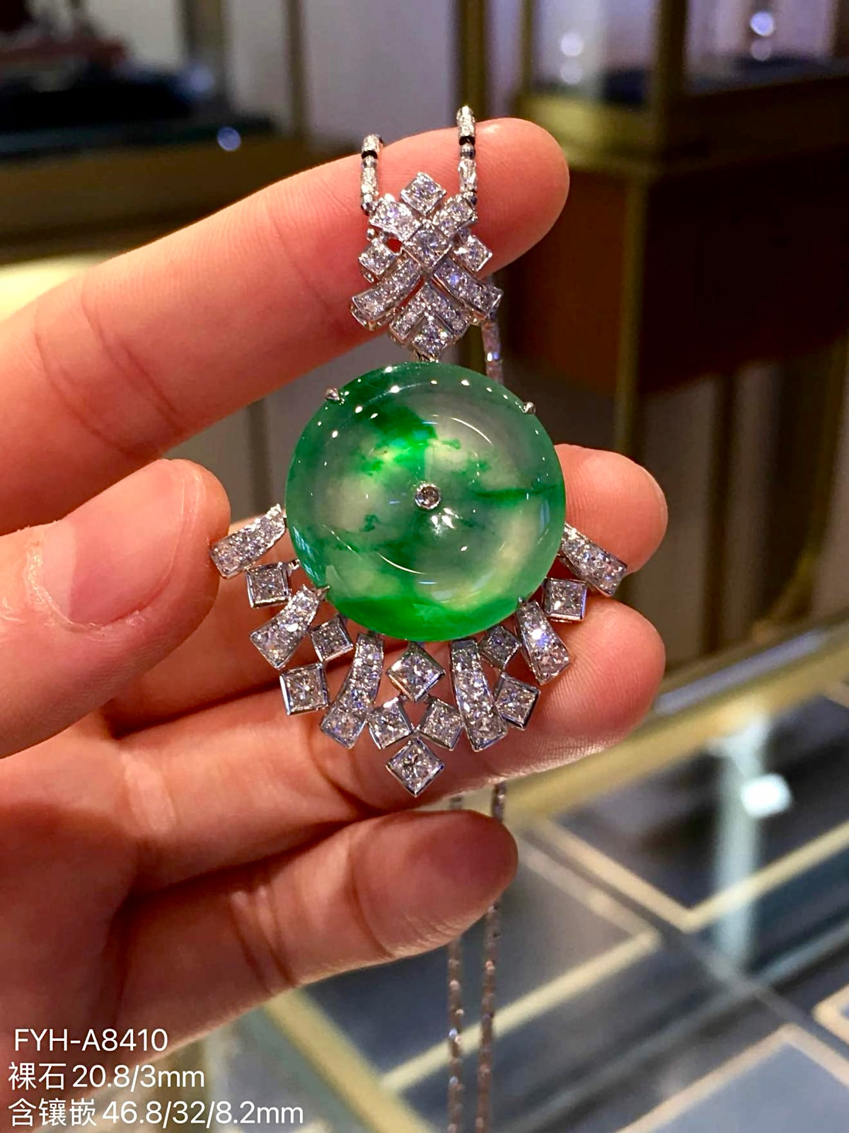 Front view of FYH-A8410, a glass jadeite Ping An Kou pendant with floating green color, set in 18K gold and diamonds
