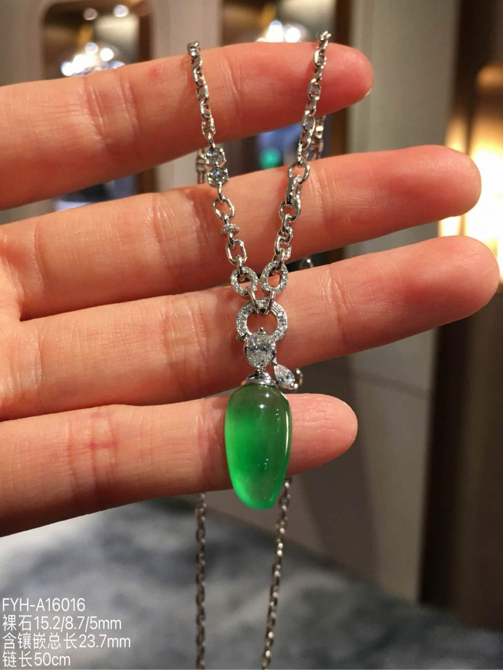 Glassy Muna Vivid Green Jadeite Fu Gua Necklace with 18K Gold and Diamonds