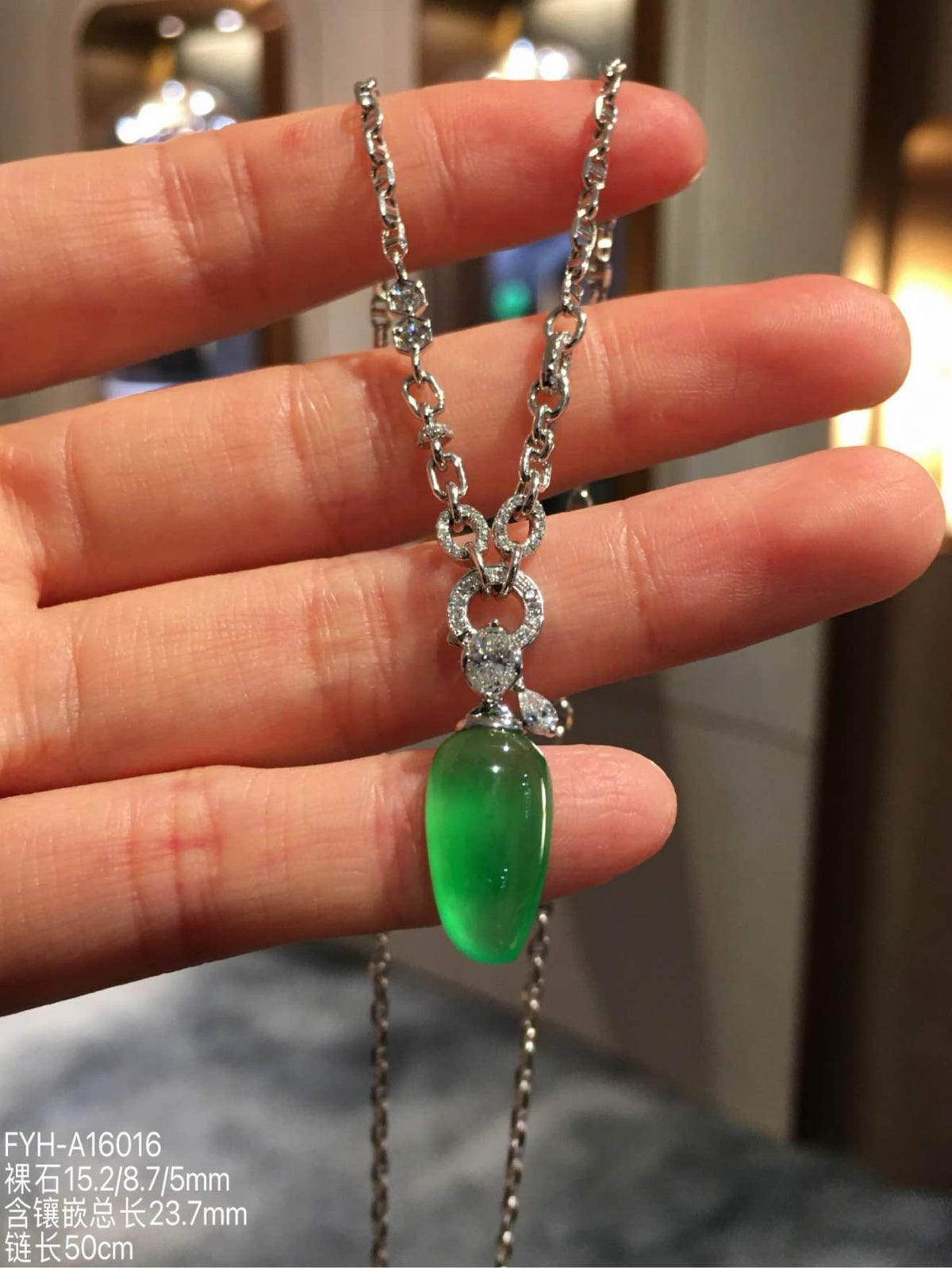 Glassy Muna Vivid Green Jadeite Fu Gua Necklace with 18K Gold and Diamonds
