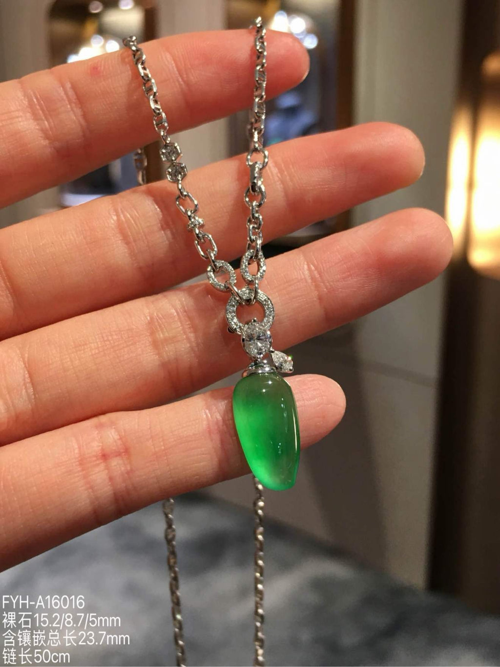 Glassy Muna Vivid Green Jadeite Fu Gua Necklace with 18K Gold and Diamonds