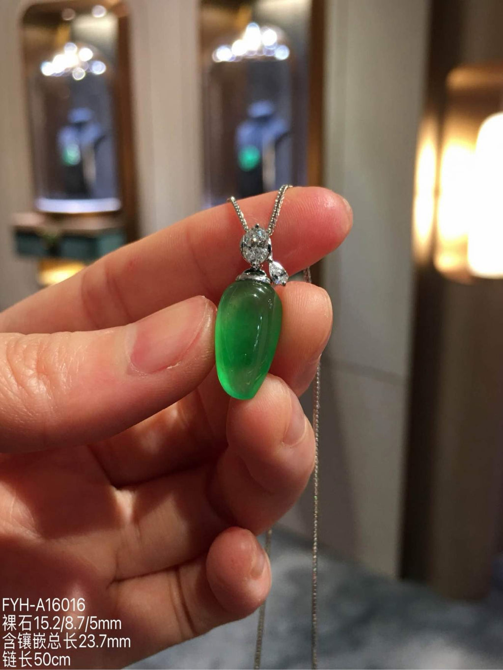 Glassy Muna Vivid Green Jadeite Fu Gua Necklace with 18K Gold and Diamonds