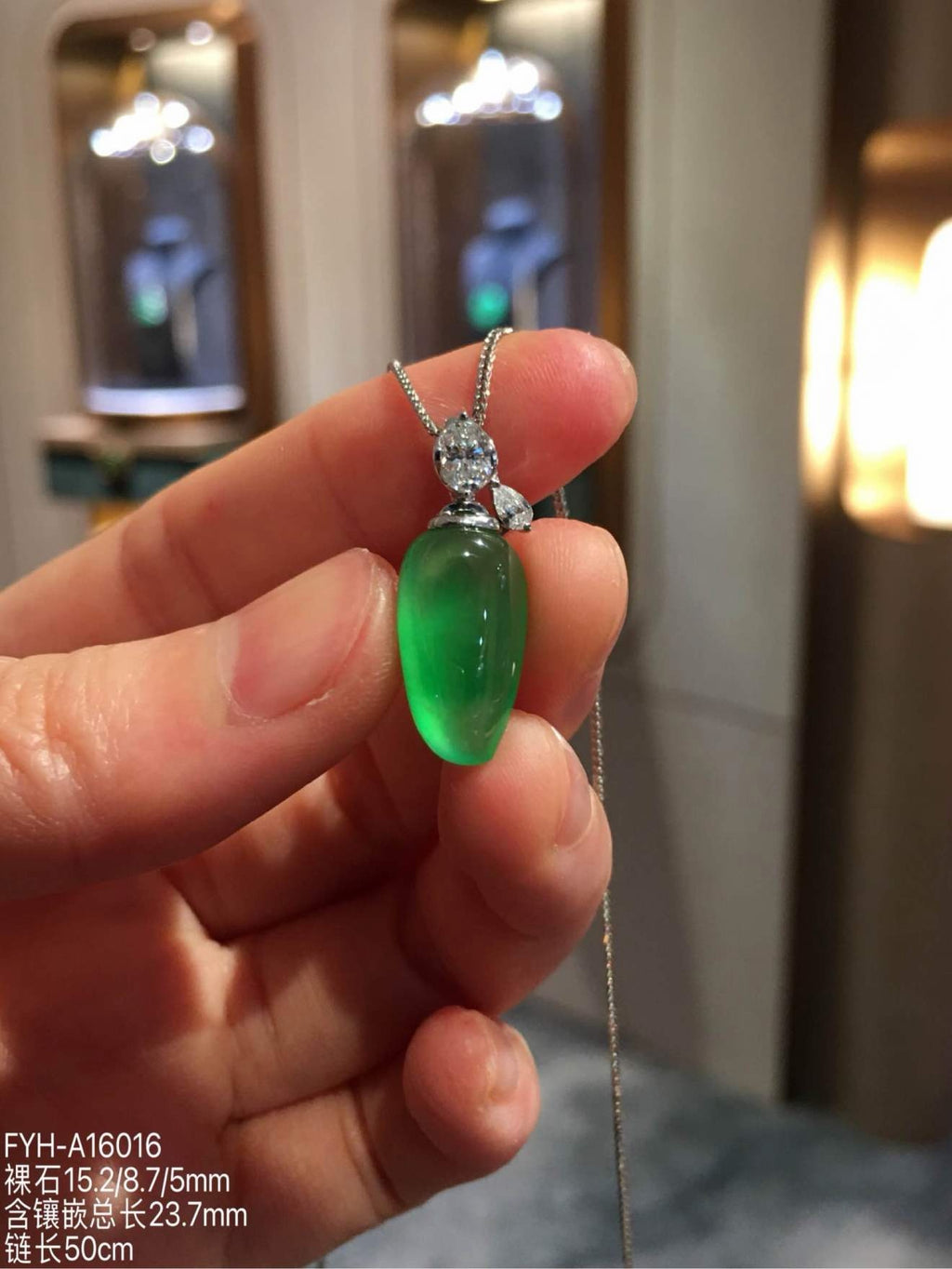 Glassy Muna Vivid Green Jadeite Fu Gua Necklace with 18K Gold and Diamonds
