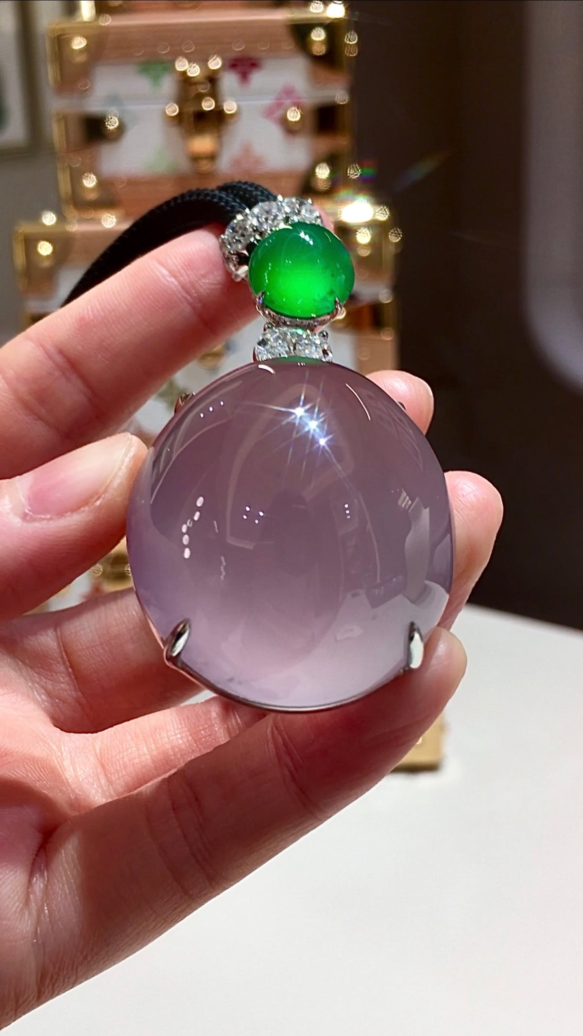 Pinkish-lavender natural jadeite double cabochon pendant with Imperial green jadeite and diamonds by Feiyuehui Jewelry