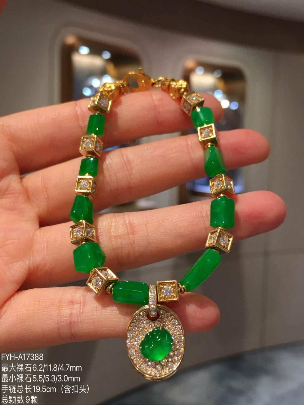 Glassy and Icy Vivid Green Jadeite Bracelet with 18K Gold and Diamonds